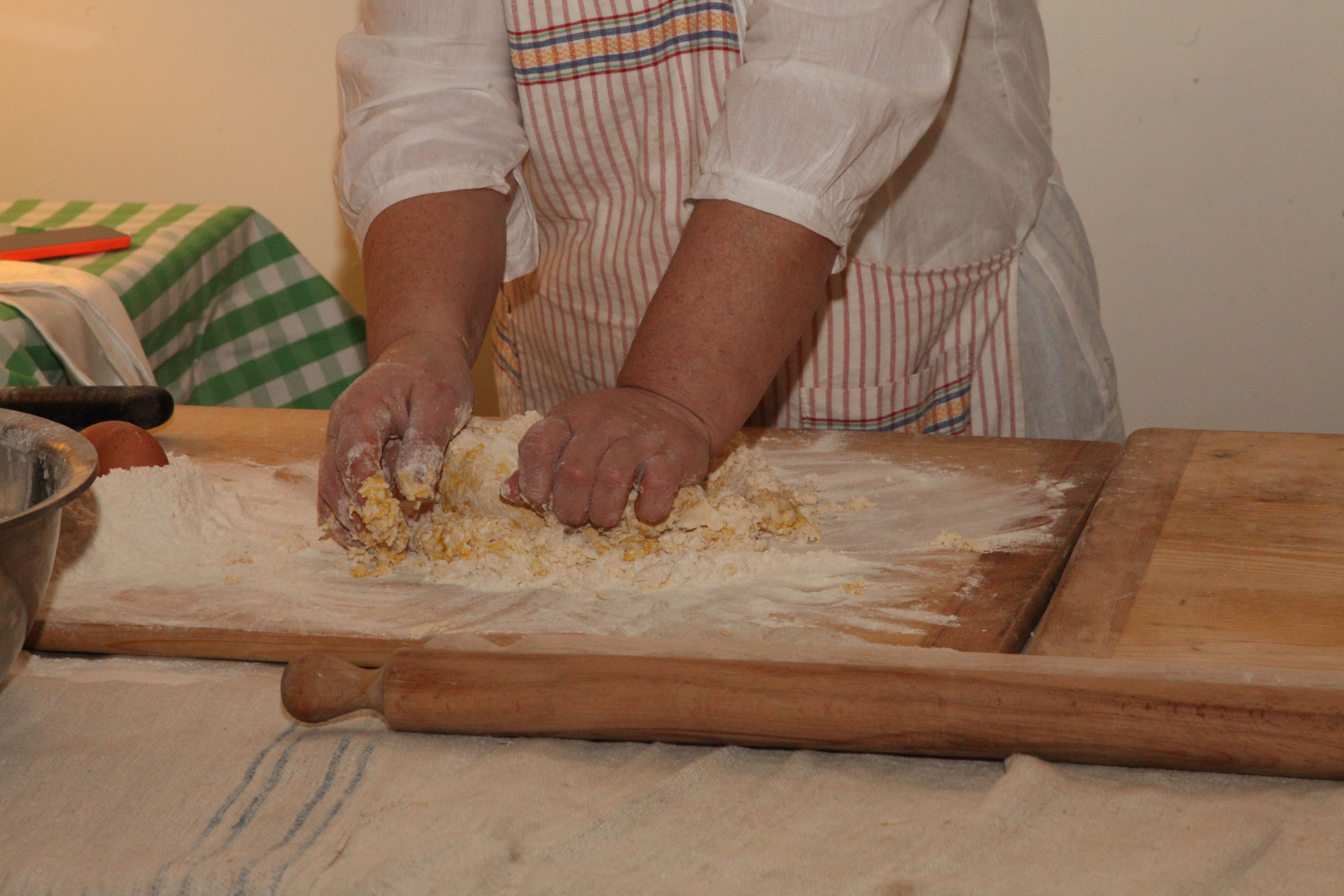 Hands in pasta